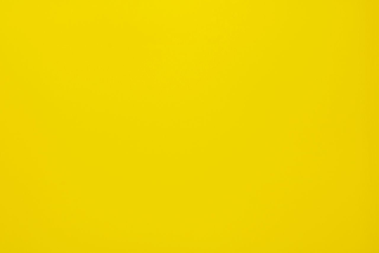 Bright yellow textured background, perfect for design projects and presentations.